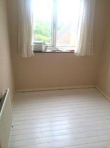 Sewing room - white painted floor